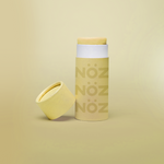 Load image into Gallery viewer, A package of Nöz classic sunscreen in the yellow variety in front of a yellow background
